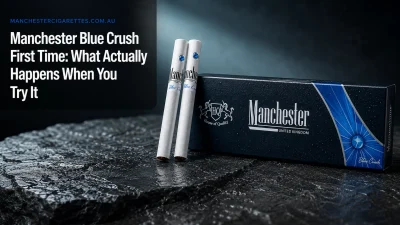Manchester Blue Crush cigarette carton and two cigarettes on a dark stone surface with the headline Manchester Blue Crush First Time: What Actually Happens When You Try It